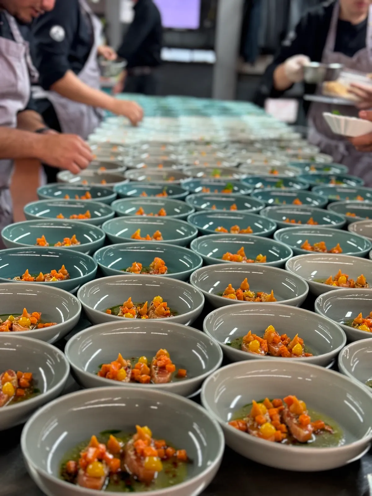 Salmon tataki line plated up — flying buffet by the WIO team